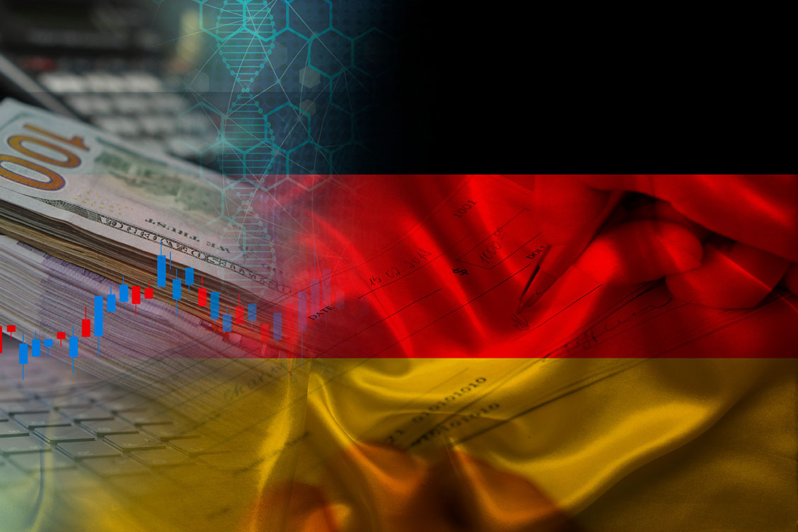 Kto komu wystawi teraz weksel? Niemiecka flaga z czekiem w tle